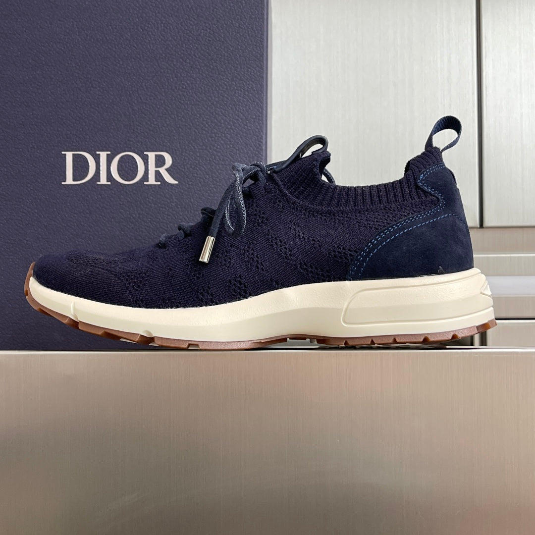 Navy lace-up unisex sneaker with knit upper and white midsole