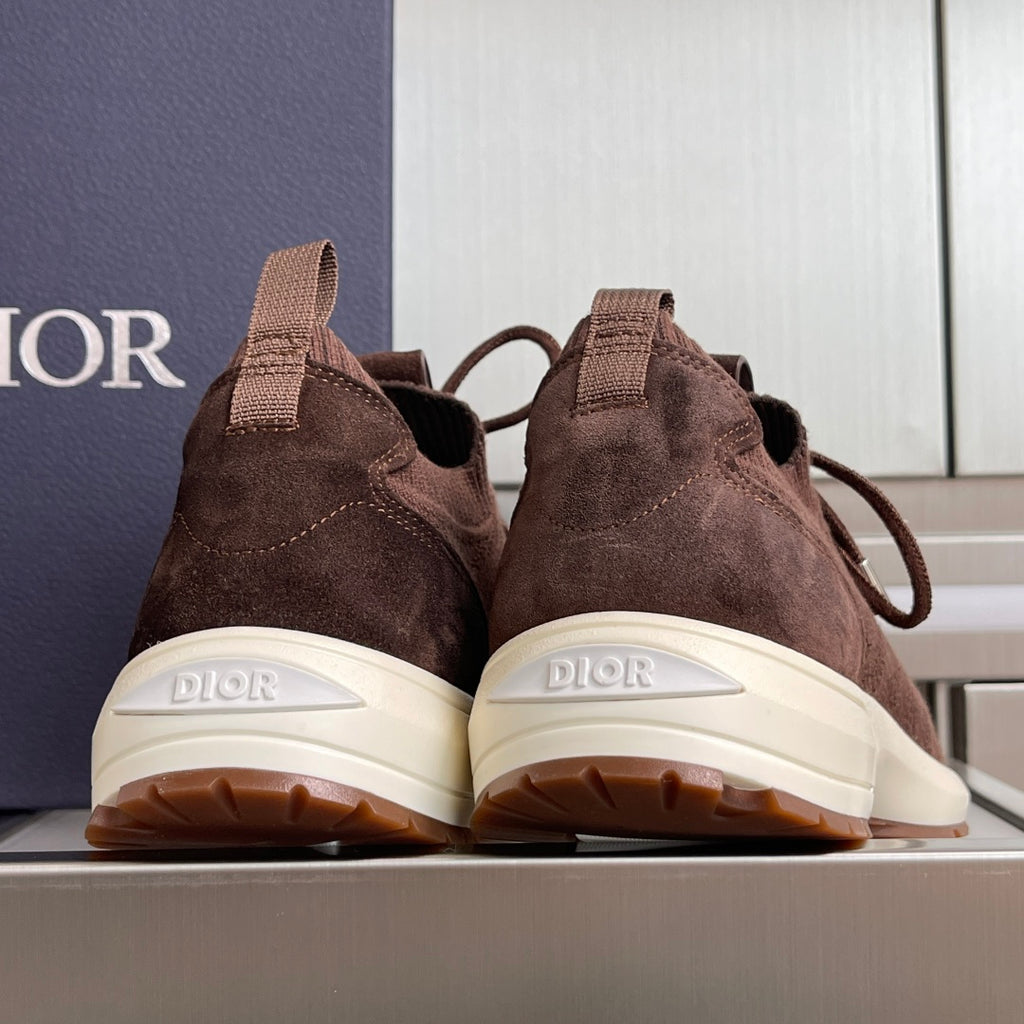 Dior unisex sneakers from back: dark brown uppers with white soles and DIOR branding