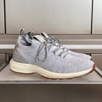Grey knit unisex sneakers with lace-up detail and cream sole, Dior emblem on heel