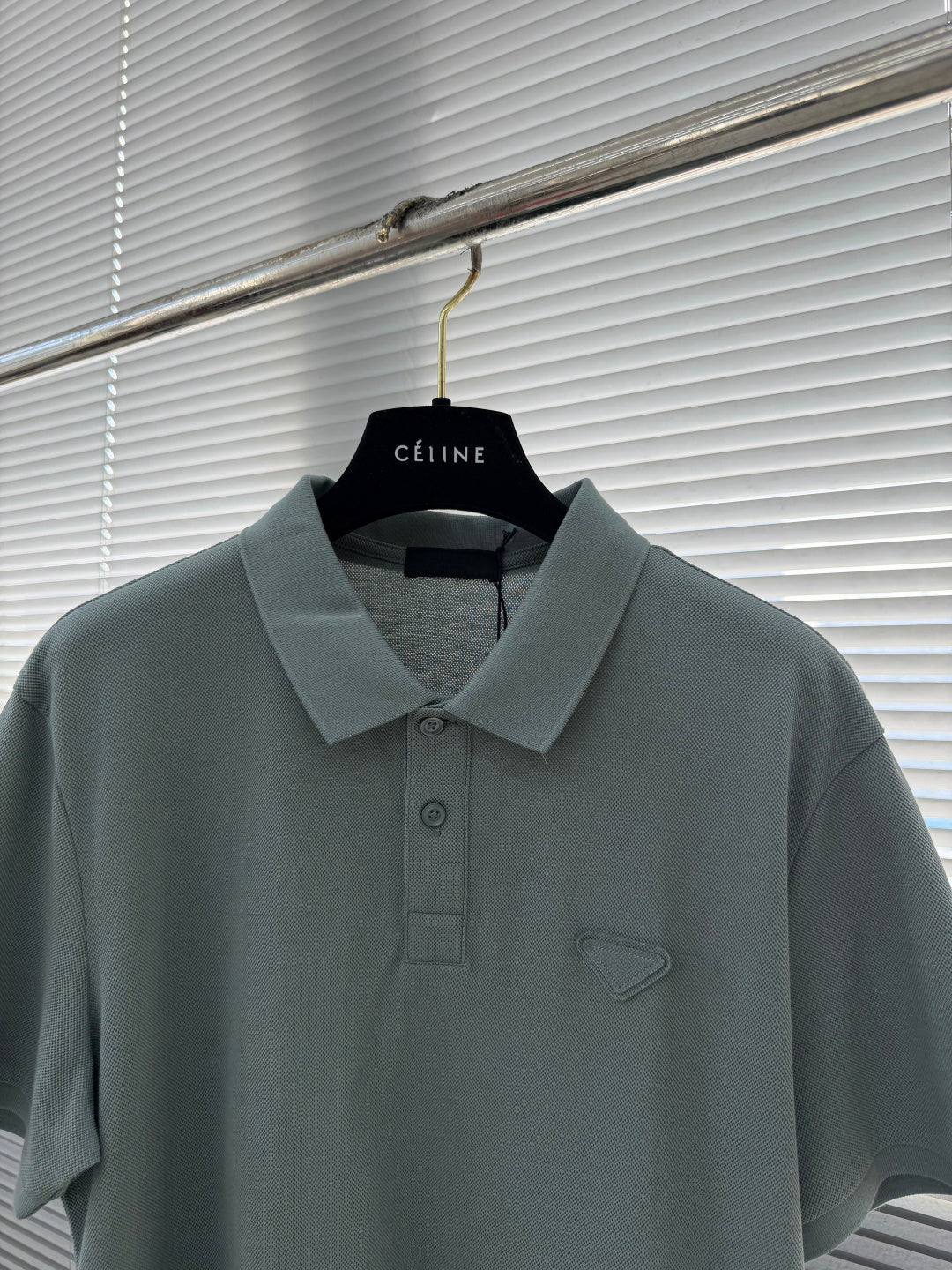 Prada polo shirt, muted teal with foldover collar and embroidered chest emblem