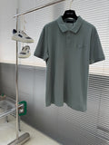 Prada polo shirt, muted teal with buttoned collar and chest pocket
