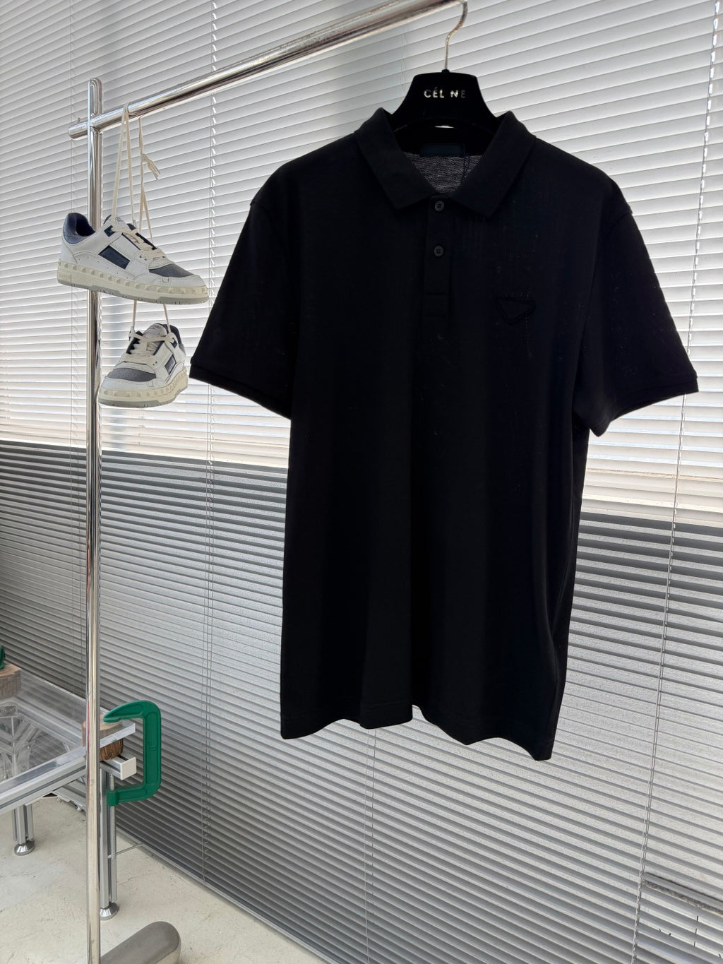 Prada short-sleeve polo shirt, dark knit with button placket and collar