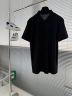 Prada short-sleeve polo shirt on hanger, dark knit with V at placket