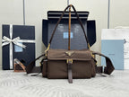 Prada shoulder bag in dark brown with front flap and gold-tone logo triangle