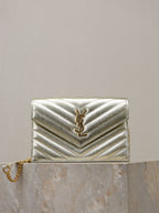 YSL chevron-quilted metallic gold shoulder bag with YSL logo and chain strap