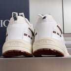 Dior unisex sneakers heel view, white uppers with brown outsole and Dior branding