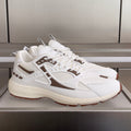 Dior unisex sneakers in white with brown accents and lace-up front, chunky sole
