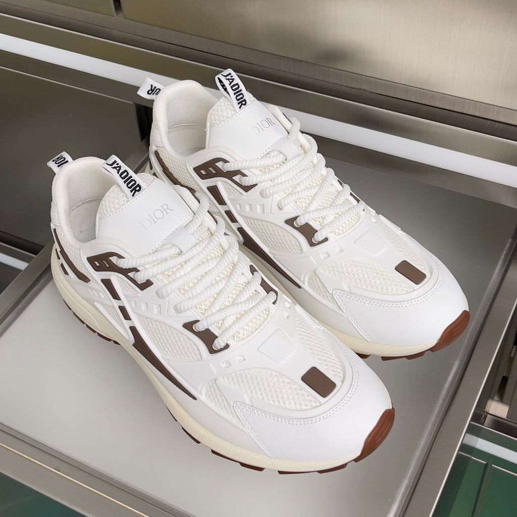 Dior unisex sneakers pair, white uppers with brown trim details and thick cushioned sole