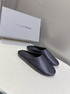 Balenciaga black slide sandals, smooth upper with embossed logo on strap