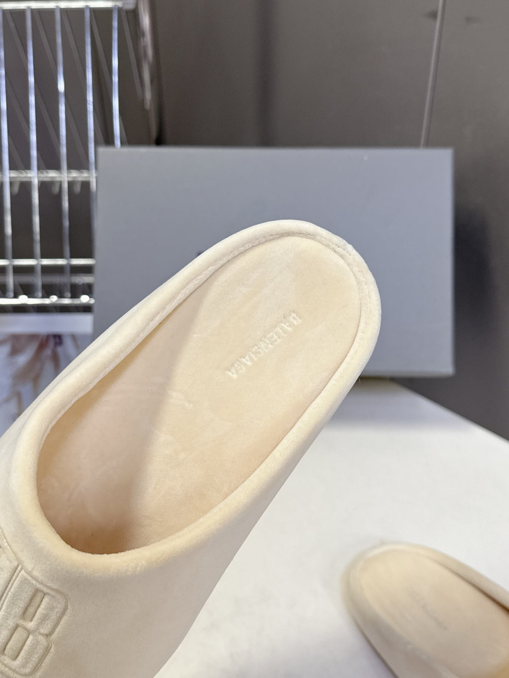 Balenciaga slide sandal, light beige, close-up of footbed interior