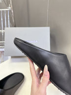 Balenciaga black slide sandal, textured upper with embossed logo on strap