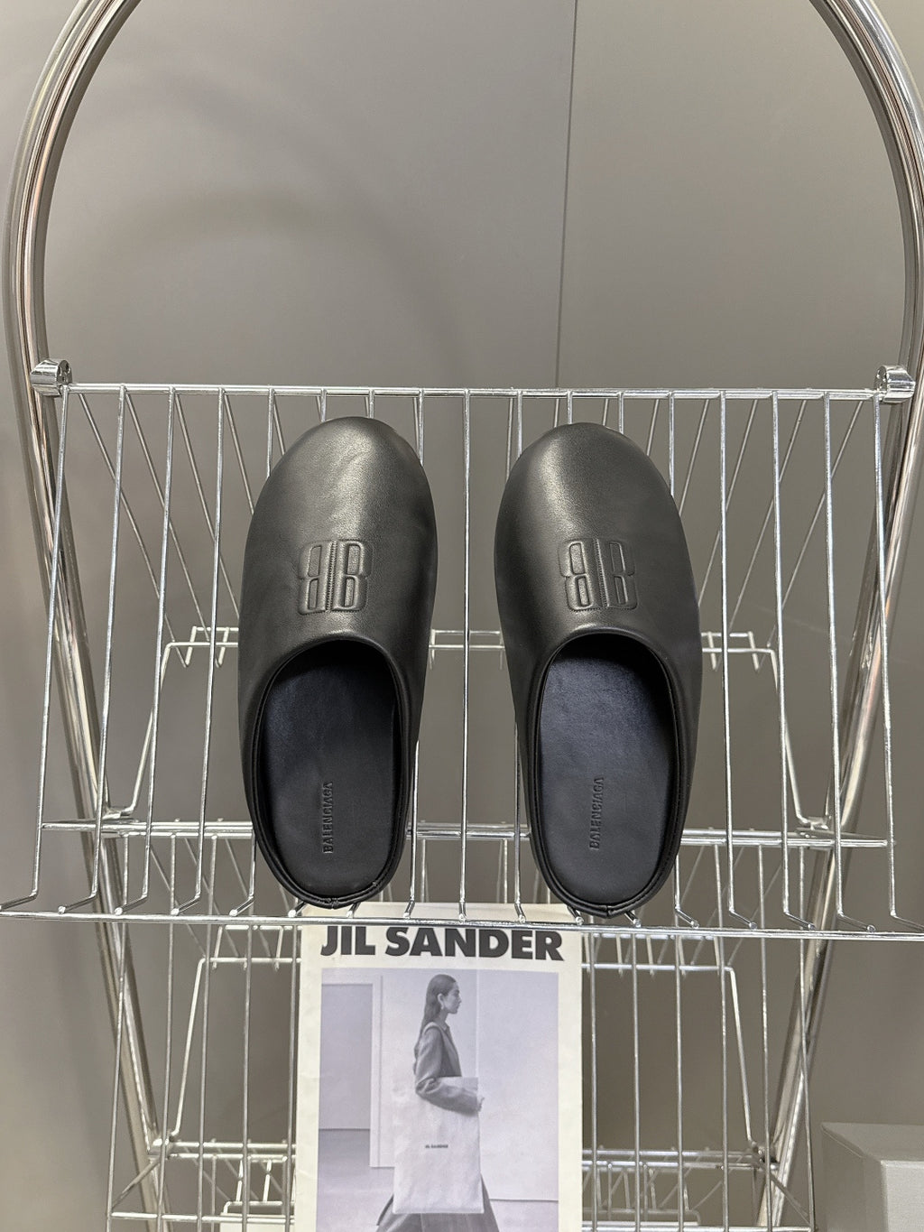 Balenciaga black slide sandals, branding on footbed, open-toe silhouette
