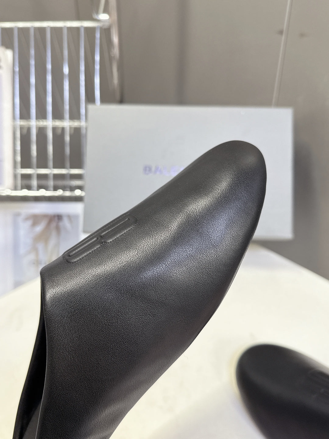 Balenciaga black slide sandal, smooth textured upper, slip-on toe