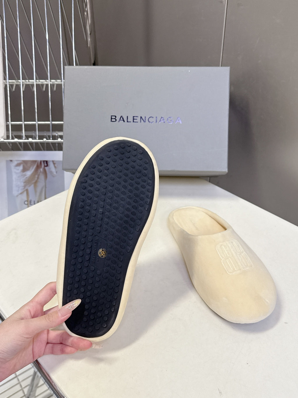 Balenciaga slide sandals, outsole view in dark blue with textured grip surface