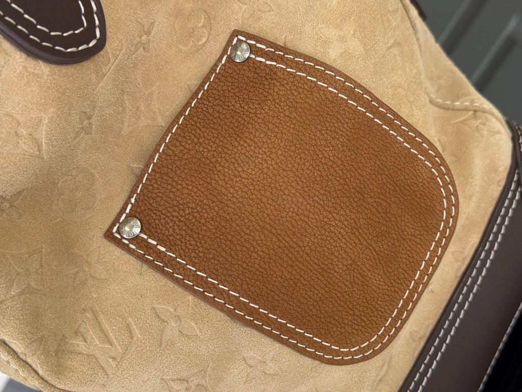 Louis Vuitton bag, tan canvas with brown patch and white contrast stitching
