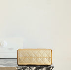 Chanel quilted metallic-gold flap bag with chain shoulder strap