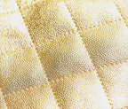 Gold quilted leather texture