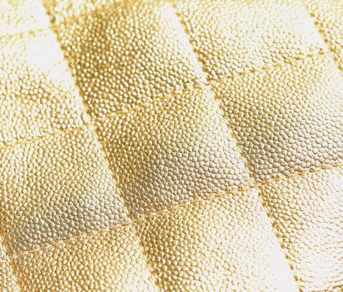 Gold quilted leather texture