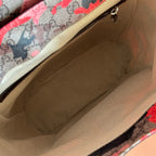 Gucci backpack interior view with beige lining and open top zipper opening