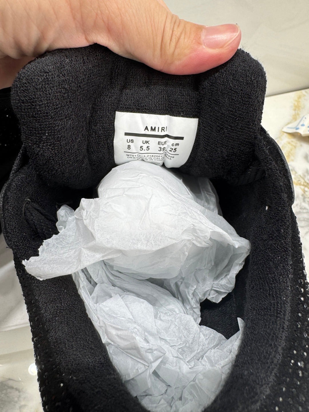 Amiri luxury shoes size label inside black fabric lining and cushioned collar