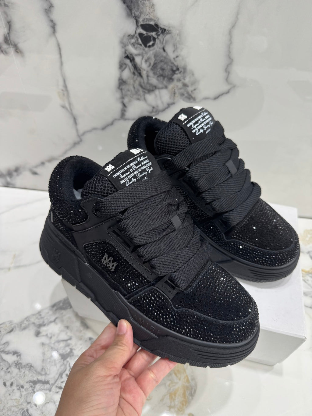 Amiri luxury shoes black lace-up sneakers with speckled finish and padded collar
