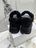 Amiri luxury shoes black sneakers with embossed heel logo on chunky sole