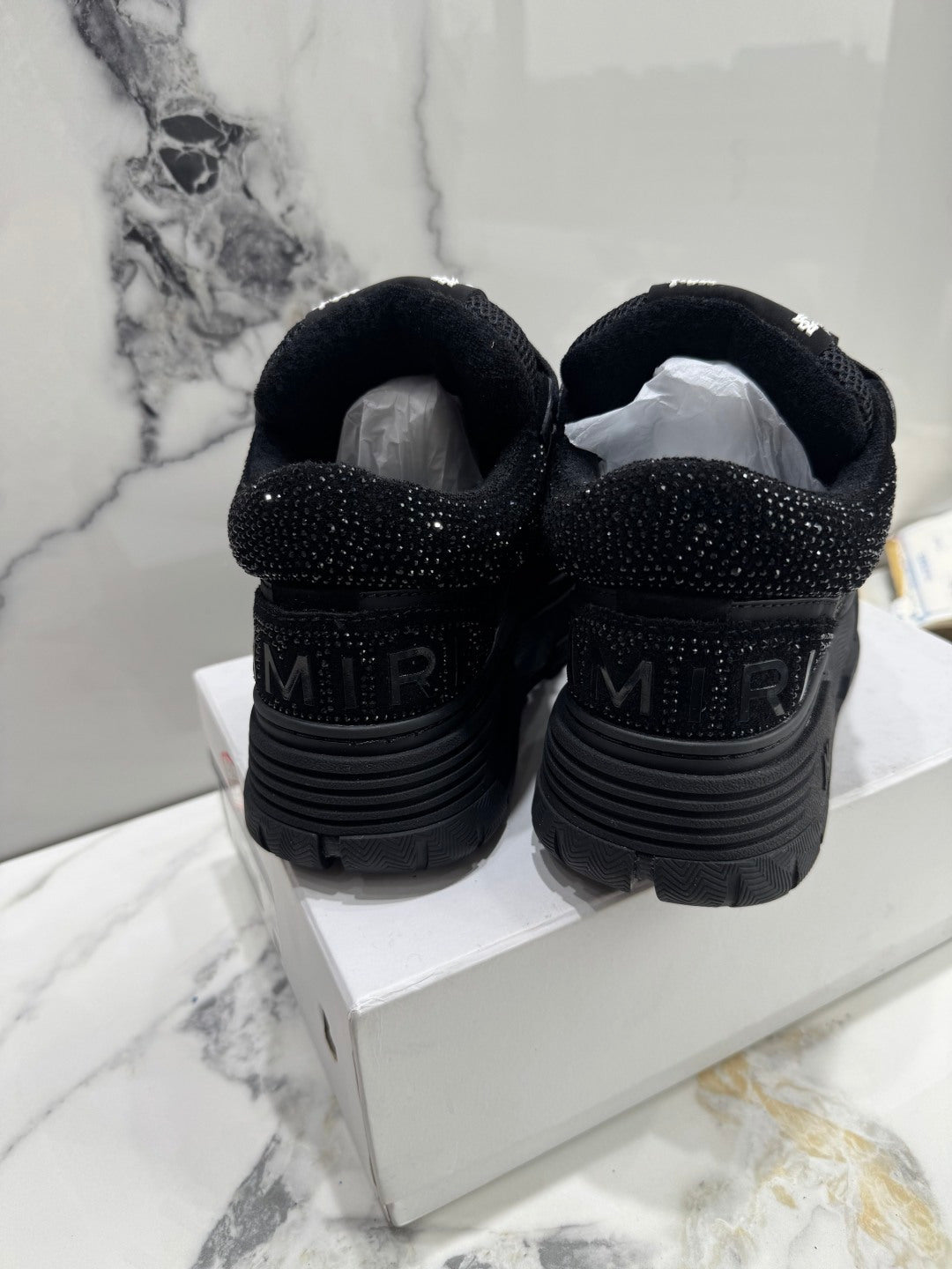 Amiri luxury shoes black sneakers with embossed heel logo on chunky sole
