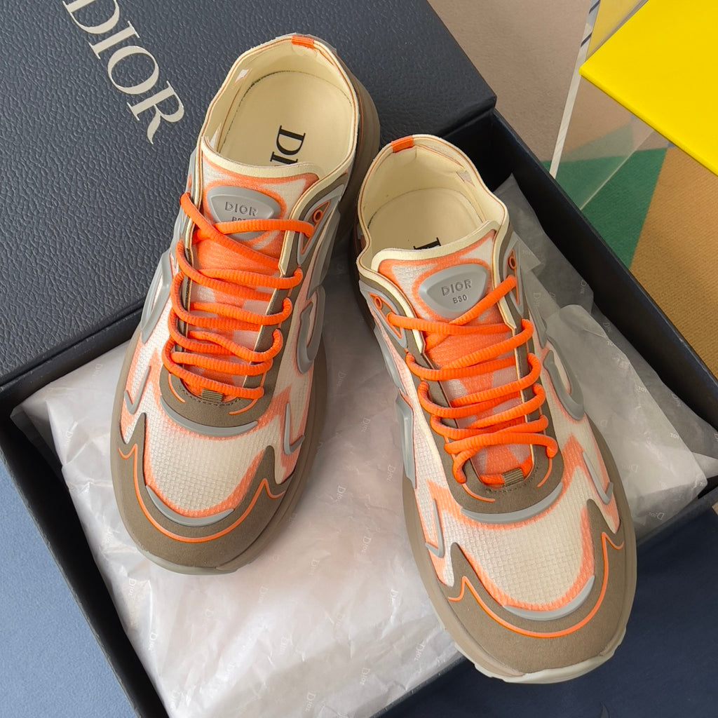 Dior unisex sneakers, front view with orange laces and beige interior