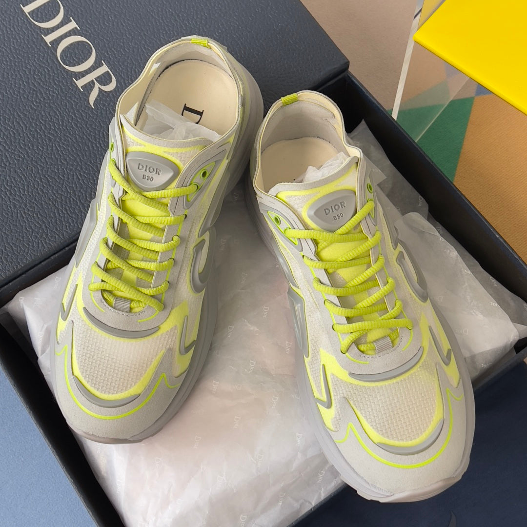 Dior unisex sneakers, front view, light gray mesh with neon lime laces