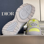 Dior unisex sneakers, outsole view, light gray tread with neon lime heel accents