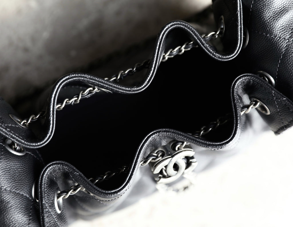 Black leather interior with chain strap and CC logo hardware detail