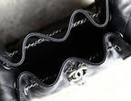 Black leather interior with chain strap and CC logo hardware detail