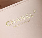 Pink Chanel leather with gold "CHANEL" and "MADE IN ITALY" emboss
