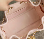 Pink Chanel bag interior with card slot and stitched lining