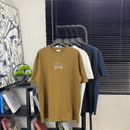 Men's short-sleeve t-shirt, mustard/brown, small chest logo graphic