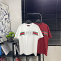 White Gucci logo T-shirt with green and red stripe horsebit graphic
