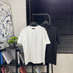 White short-sleeve T-shirt on hanger with Gucci logo at chest