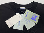 Burberry crewneck T-shirt on hanger, dark fabric with hanging product tags