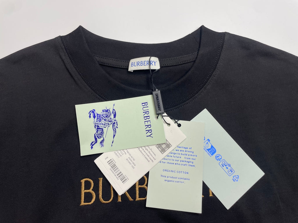 Black crewneck T-shirt with hanging price and logo tags