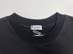 Navy crewneck T-shirt collar with Burberry brand tag at neckline