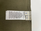 Burberry olive T-shirt hem with size and care label stitched along the inside edge