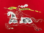 Red T-shirt fabric with white and yellow illustrated horse and pro graphic