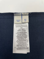 Navy T-shirt size XS TP care label with fabric and made-in details.