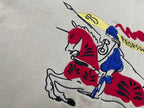 Burberry beige T-shirt close-up with red and blue rider graphic