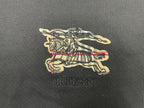 Embroidered horse logo and BURBERRY text on dark t-shirt fabric