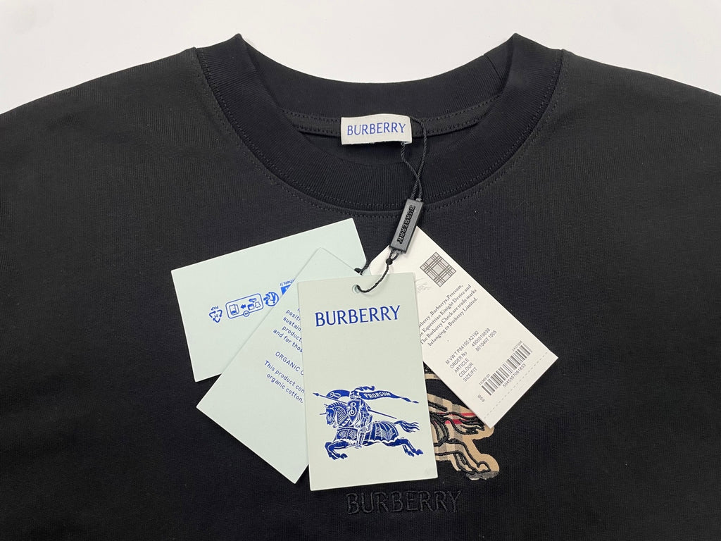 Dark short-sleeve t-shirt with hang tags and embroidered logo at center