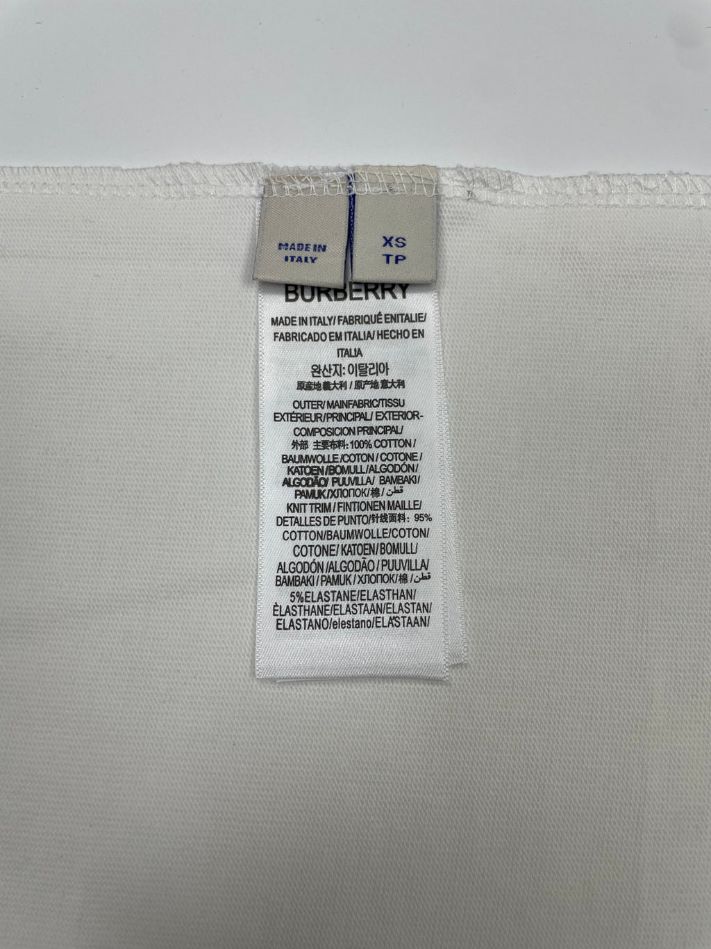 Burberry T-shirt size and care label with XS and fabric composition