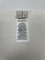 Burberry T-shirt size and care label with XS and fabric composition
