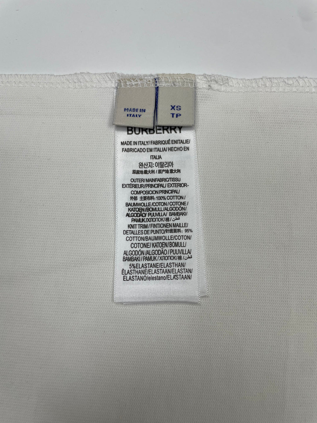 Burberry T-shirt size and care label with XS and fabric composition