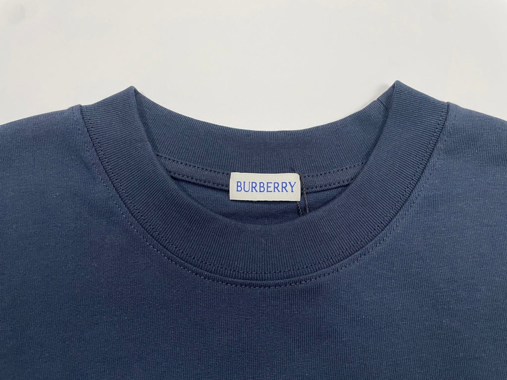 Navy crew-neck T-shirt collar with Burberry neck label